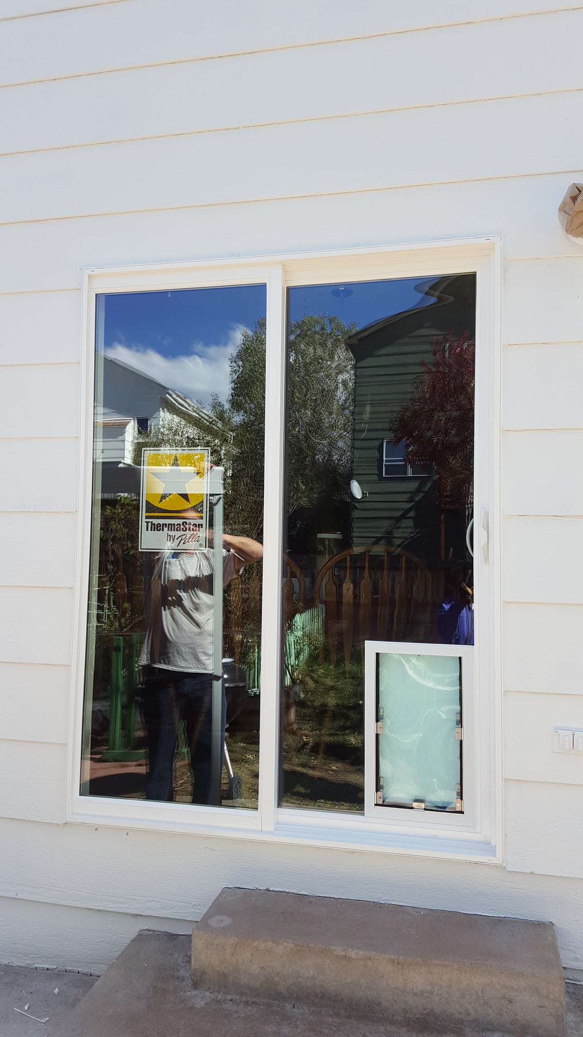 Brand new slider with a Hale pet door professionally installed.