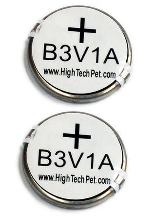 Two round silver and white button cell batteries with black text reading 'B3V1A', a plus sign, and 'www.High Tech Pet.